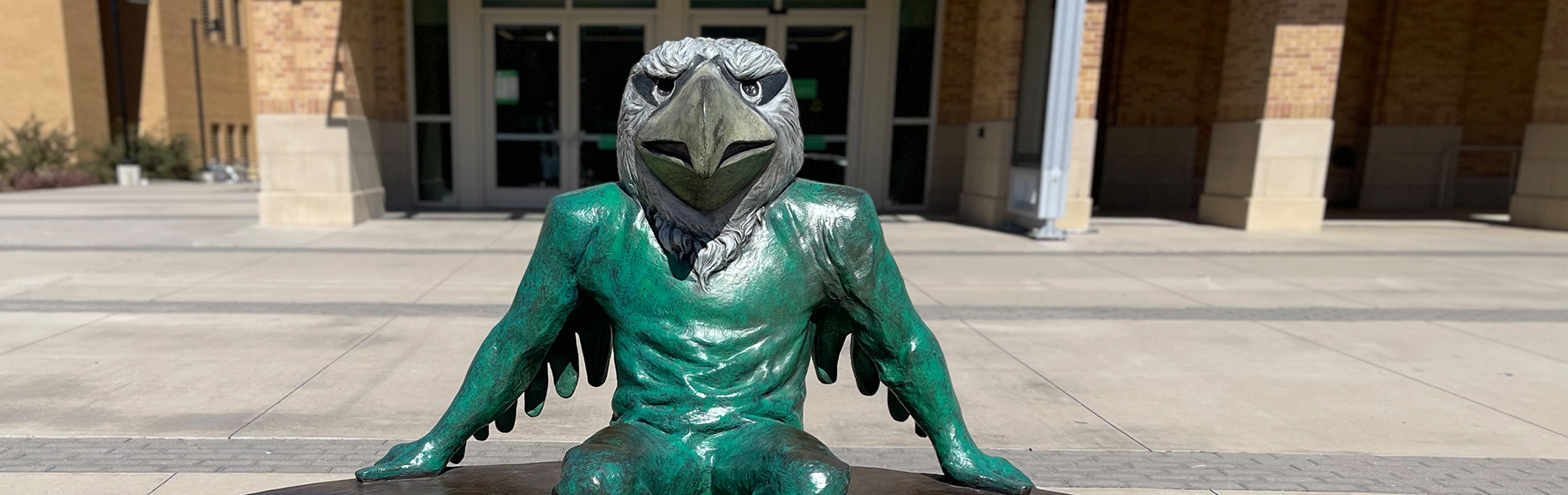 Scrappy on the bench, south side of the UNT University Union