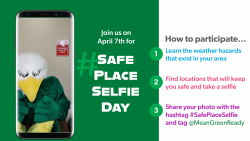 Scrappy the Eagle on the ground with knees close to chest for #SafePlaceSelfieDay on April 7